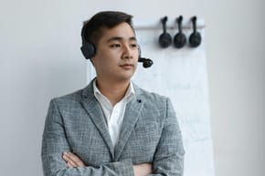 Why Do They Wear Headphones in F1 Meetings?