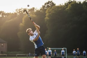 Can a Hockey Player Play the Ball Above Shoulder Height?