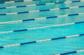 Why Is It Better to Swim in the Middle Lanes?