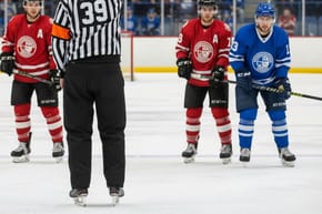 How Does the Referee Signal a Penalty in Hockey?