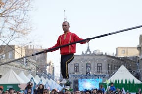 Why Do Tightrope Walkers Use Pole Physics?
